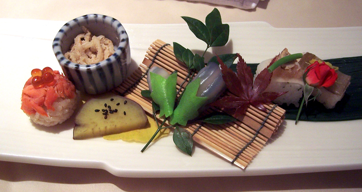 Japanese food decorated with Autumn leaves