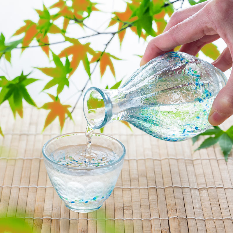Pouring Japanese sake from a tokkuri jug