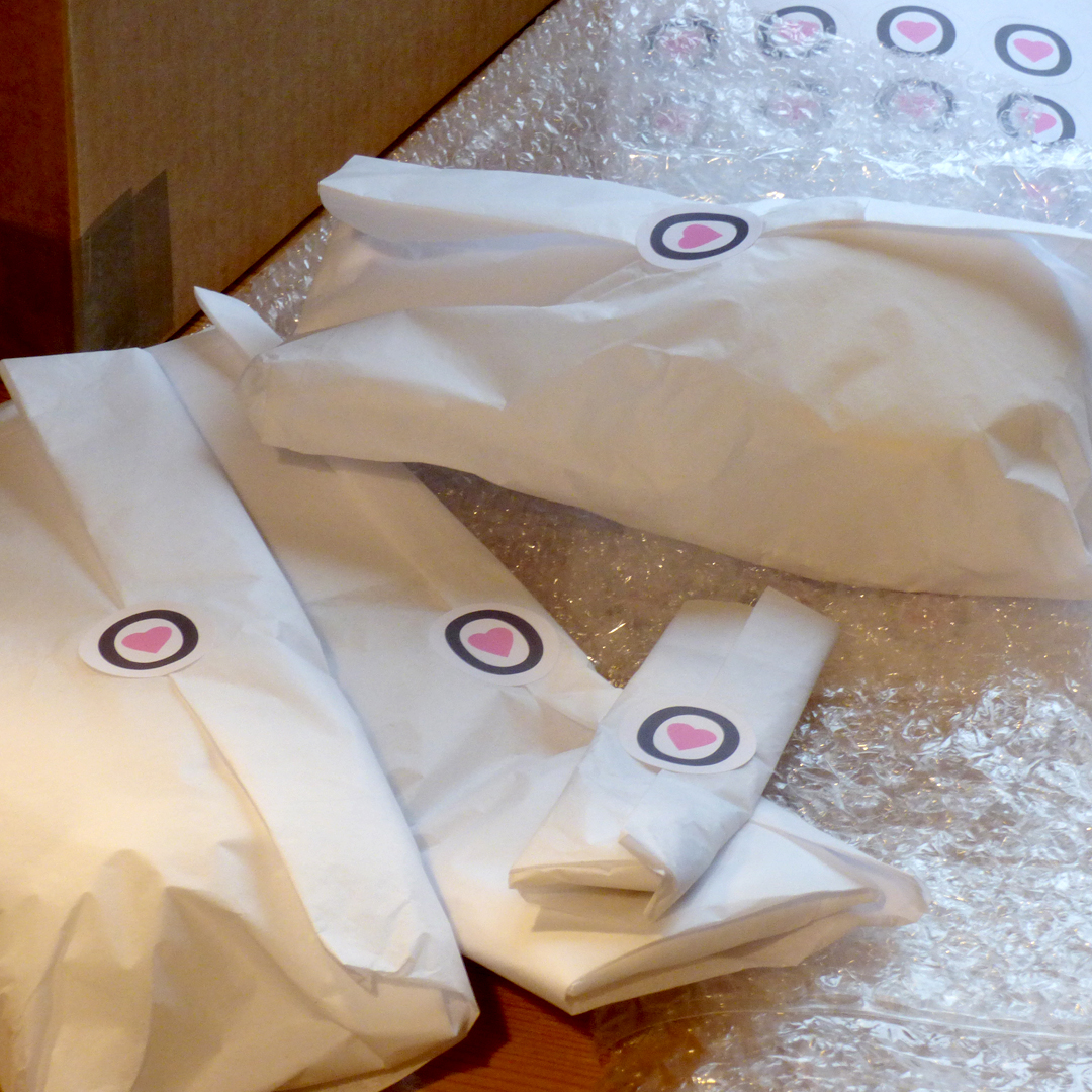 Your items are wrapped in tissue with Hatsukoi stickers