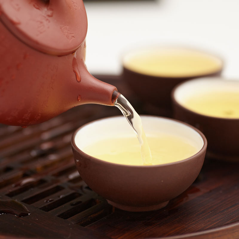 Japanese tea poured from a teapot