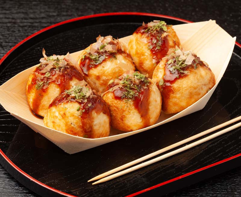 Takoyaki in a bamboo boat