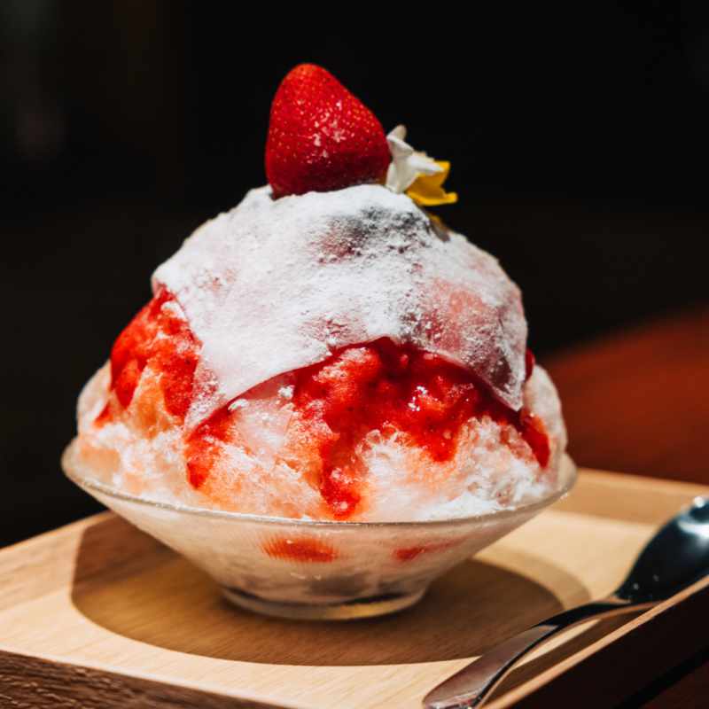 Japanese shaved ice, kakigori, with strawberry syrup