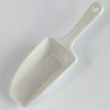 Large white ceramic kitchen measuring scoop
