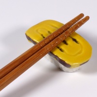 Tamago egg omlette sushi chopstick rest