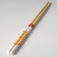 Japanese cooking chopsticks with yellow citrus pattern decoration
