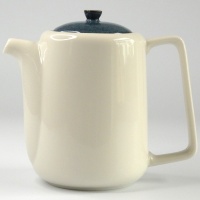 Tall white Japanese teapot with mottled dark blue lid