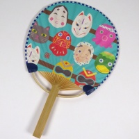 Japanese round uchiwa fan with traditional masks design