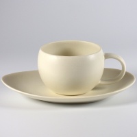 White Japanese cup with oval saucer