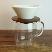 Pour-over coffee jug with white ceramic coffee filter cone