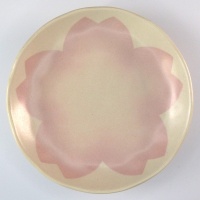 White Japanese mini plate with large sakura flower in pale pink