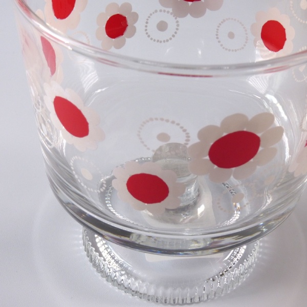 Close up details of red and white retro flower design