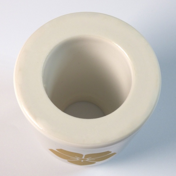 Bottom of white ceramic Japanese toothbrush holder