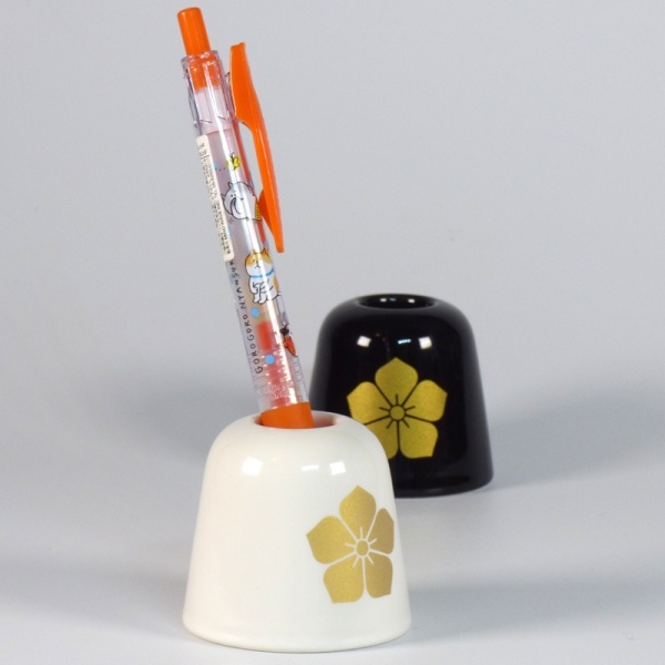 White and black ceramic pen holders