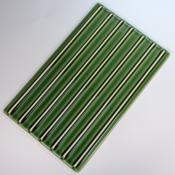 Underside of green rectangular plate