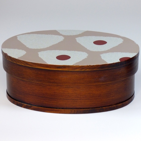 Dark wood bento box with painted lid
