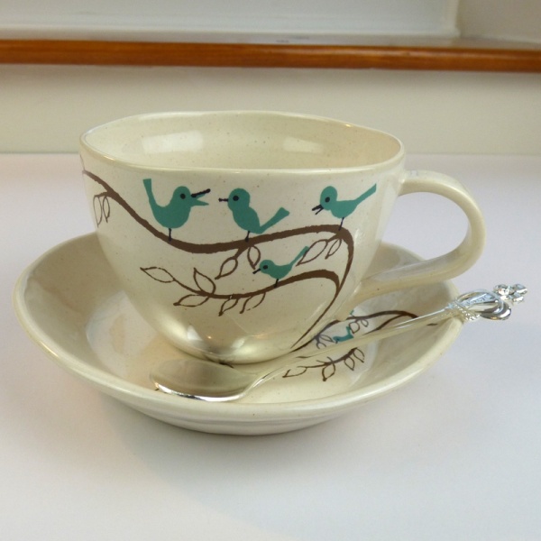 Bluebird design cup and saucer with Royal Crown teaspoon
