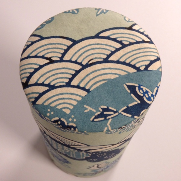 Top of tall washi paper tea caddy with blue Aomi wave design