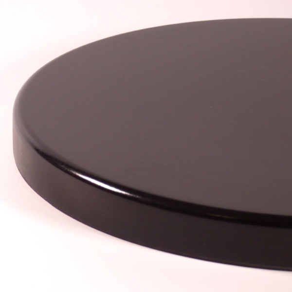 Glossy black underside of round Japanese tray