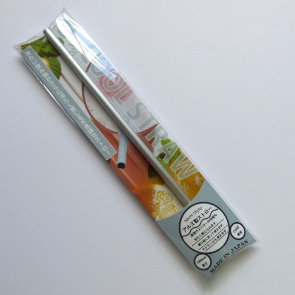 Reusable silver drinking straw in packet