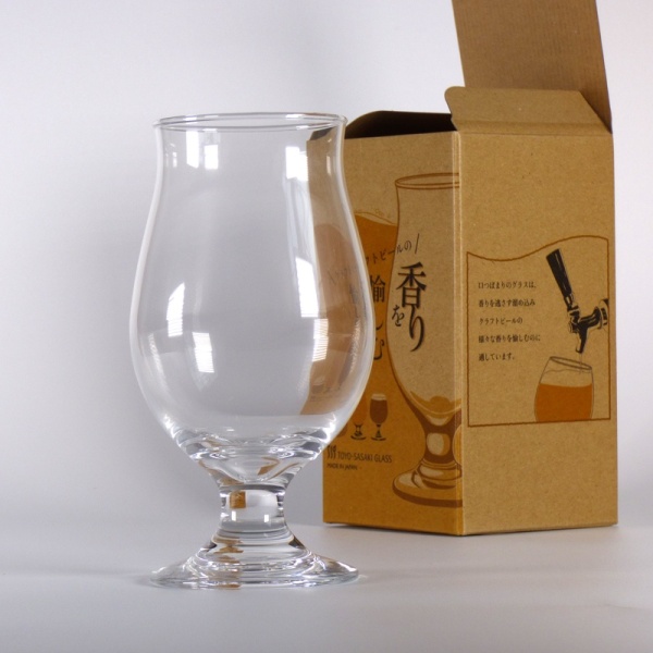 Beer glass next to box