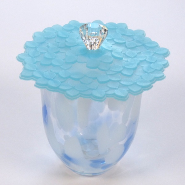 Blue Hydrangea Silicone Cup Cover on blue glass