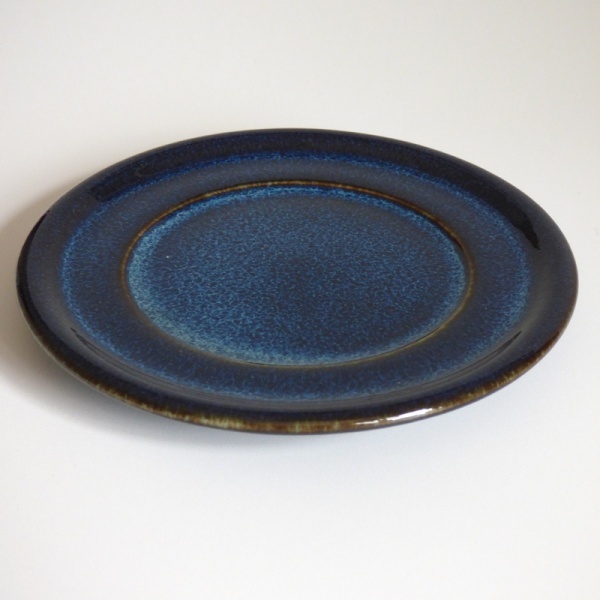 Dark blue ceramic saucer