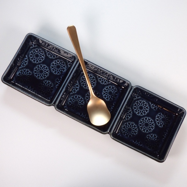 Dark blue three section dip dish with serving spoon