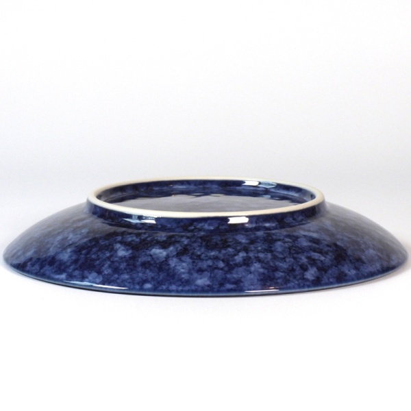 Underside of dark blue sakura plate