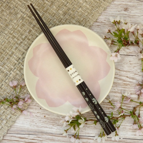 Dark wood Japanese chopsticks on Sakura plate