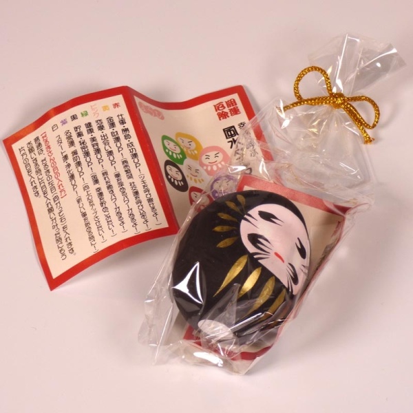 Mini traditional Japanese Daruma doll in black