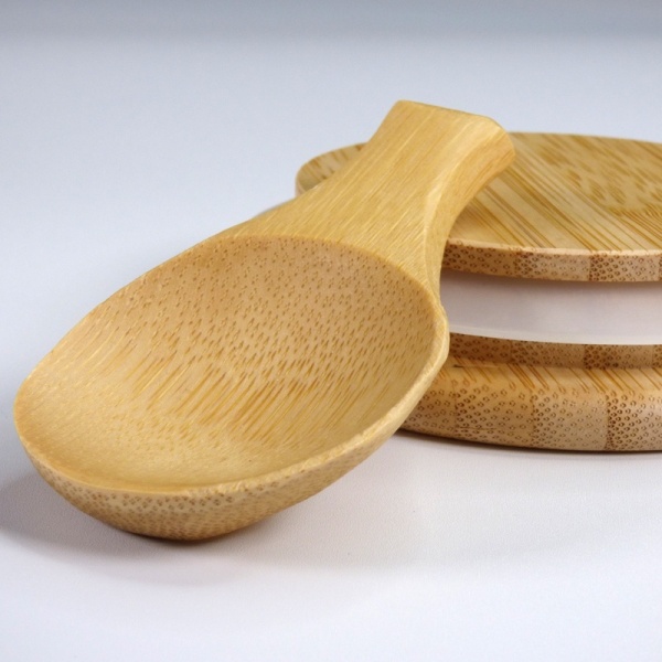 Wooden spoon and storage container lid