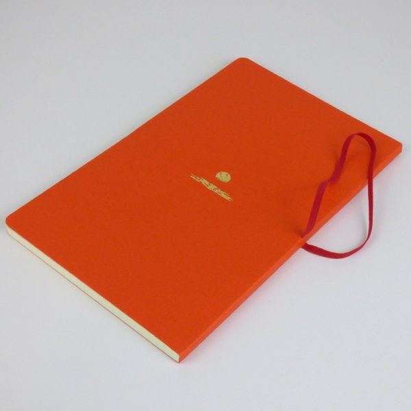 Freestyle notebook in orange 'sunset' back cover