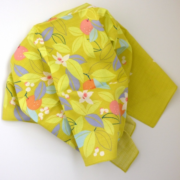 Unfolded Citrus yellow furoshiki wrapping cloth