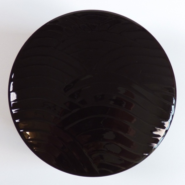 Top down view of black futamono lid