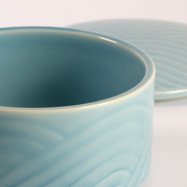 Close up of light blue Japanese lidded bowl