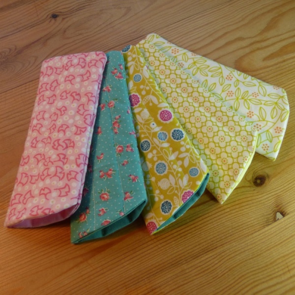Handmade quilted glasses cases in various modern prints