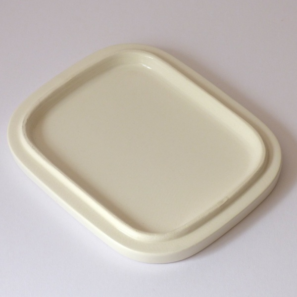 White lid of blue ceramic oven dish