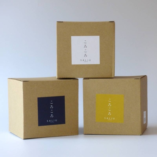 Three boxed Japanese cups in blue, yellow and grey