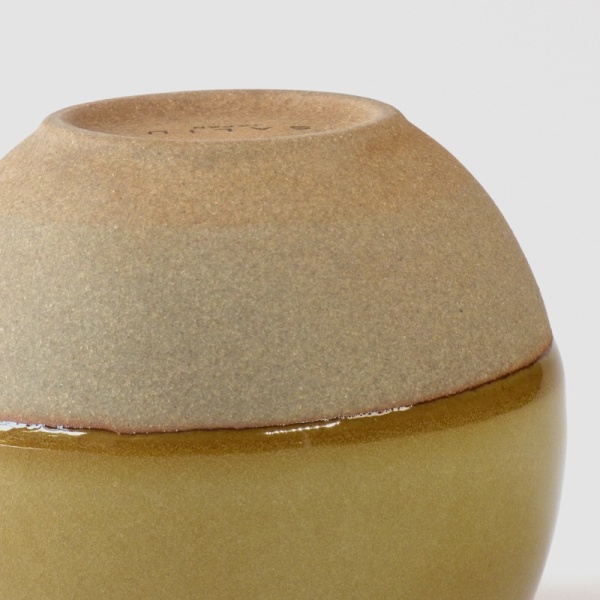 Close up of Korokoro cup unglazed stoneware underside