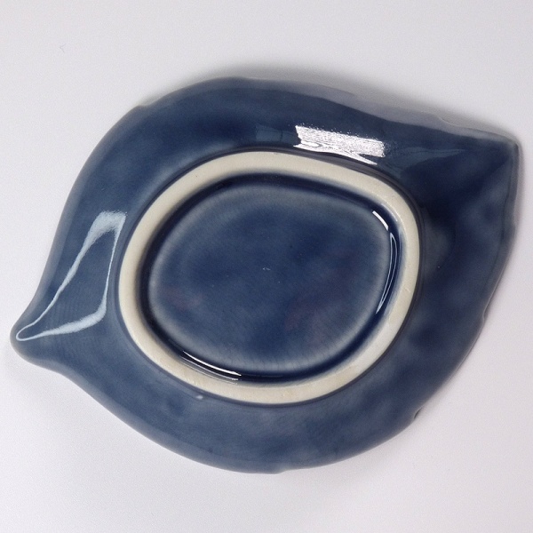 Underside of dark blue Japanese leaf plate