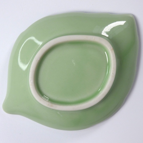 Underside of pale green Japanese leaf plate