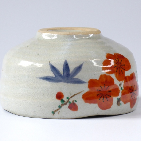 Japanese matchawan tea bowl with orange yamacha blossom design