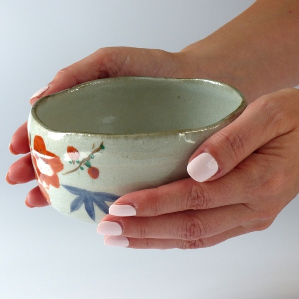 Yamacha blossom tea bowl held in hands