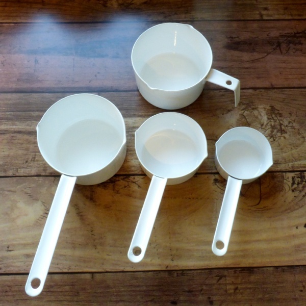 White enamel measuring cups