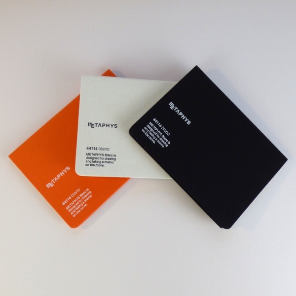 METAPHYS blanc notebooks in orange, white and black