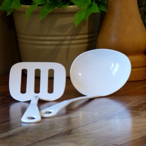 White enamel mini spatula and mini ladel in kitchen
