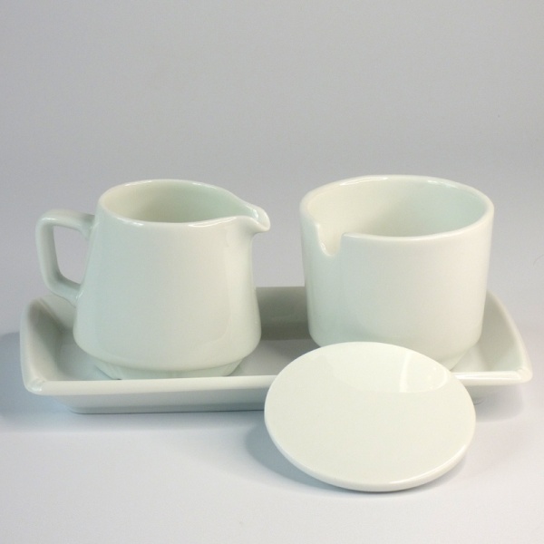 White ceramic sugar bowl and milk jug set