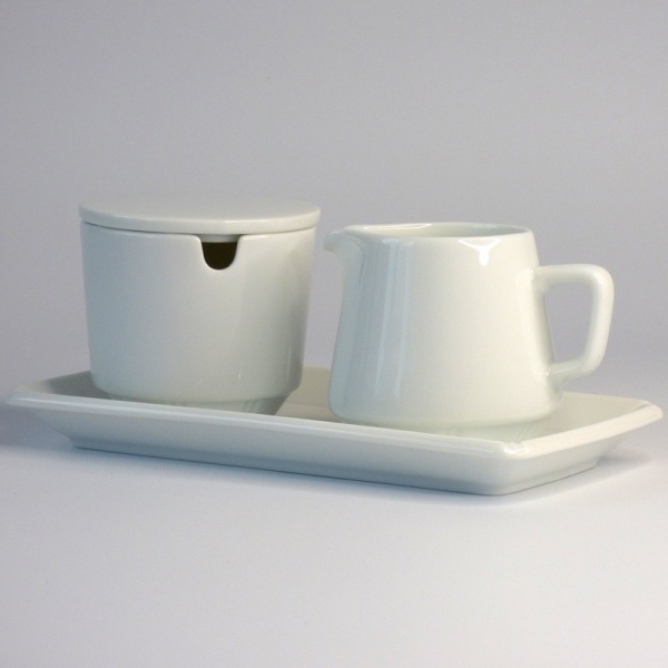 White ceramic sugar bowl and milk jug set