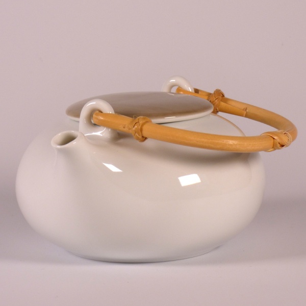 White Japanese teapot with grey lid and bamboo handle