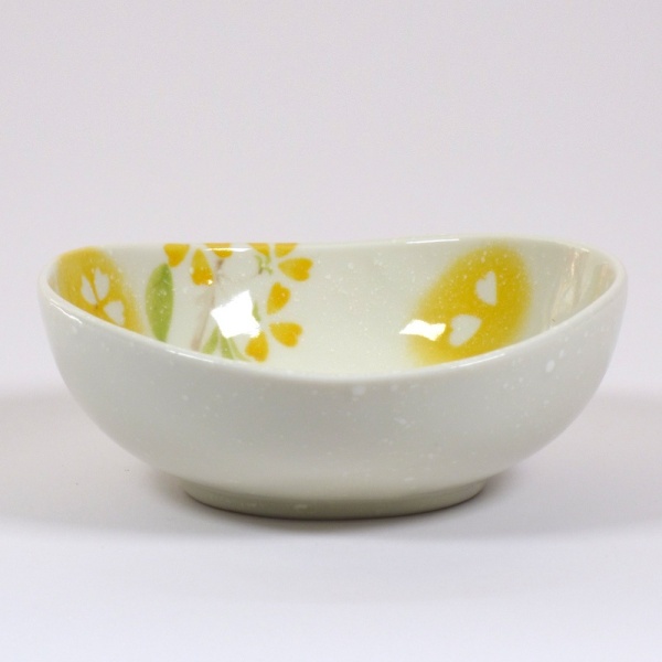'Petal' porcelain bowl in yellow, side view